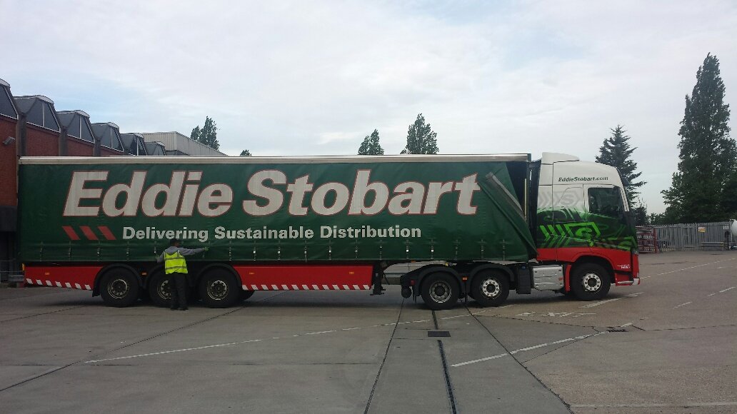 Eddie Stobart lorry at Excess Luggage Co. Heathrow facility used for disaster relief cargo transport from the UK